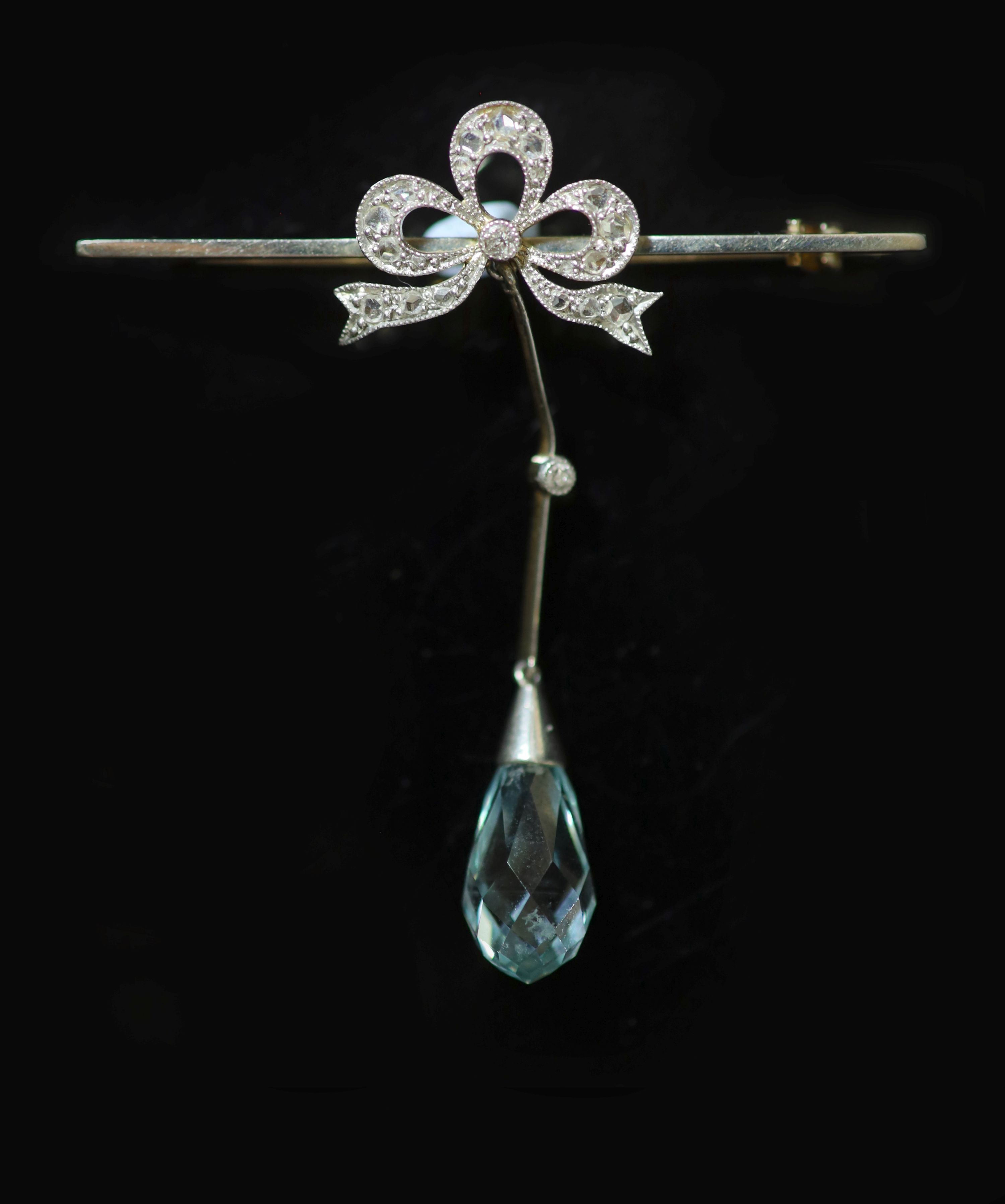 An Edwardian gold, aquamarine and rose and round cut diamond set drop bar brooch